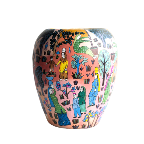 The Village Chronicle Hand-Painted Narrative Vase Bring the charm of timeless storytelling into your home. This exquisite ceramic vessel is more than just a vase; it is a canvas showcasing a vibrant tapestry of rural life. Hand-painted by skilled artisans, the intricate illustrations depict a harmonious community gathering—women in traditional attire carrying harvests, children at play, and lush, stylized flora that evokes a sense of peace and heritage. Every brushstroke tells a story, blending rich earthy tones with pops of azure and emerald to create a piece that feels both ancient and modern. Whether styled with a simple dried floral arrangement or left as a standalone statement piece, this vase adds a soulful, bohemian touch to any interior. Key Features Artisanal Craftsmanship: Each piece is individually hand-painted, ensuring that your vase is a one-of-a-kind work of art. Narrative Design: Features a 360-degree folk-art scene inspired by traditional pastoral life. Versatile Decor: The warm, multi-colored palette complements both minimalist modern spaces and eclectic, maximalist homes. Premium Finish: High-quality ceramic with a smooth matte-satin finish for a sophisticated look and feel. Product Specifications Material: 100% Hand-fired Ceramic Style: Folk-Art / Ethno-Contemporary Care: Wipe with a soft, dry cloth; avoid abrasive cleaners to preserve the hand-painted details.